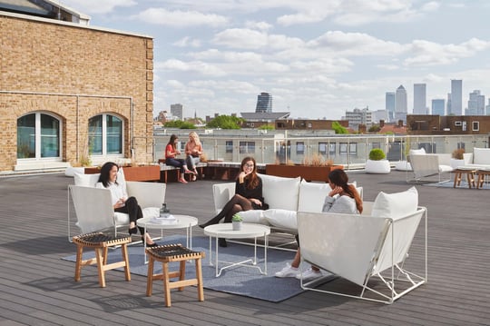 employees using patio outside office