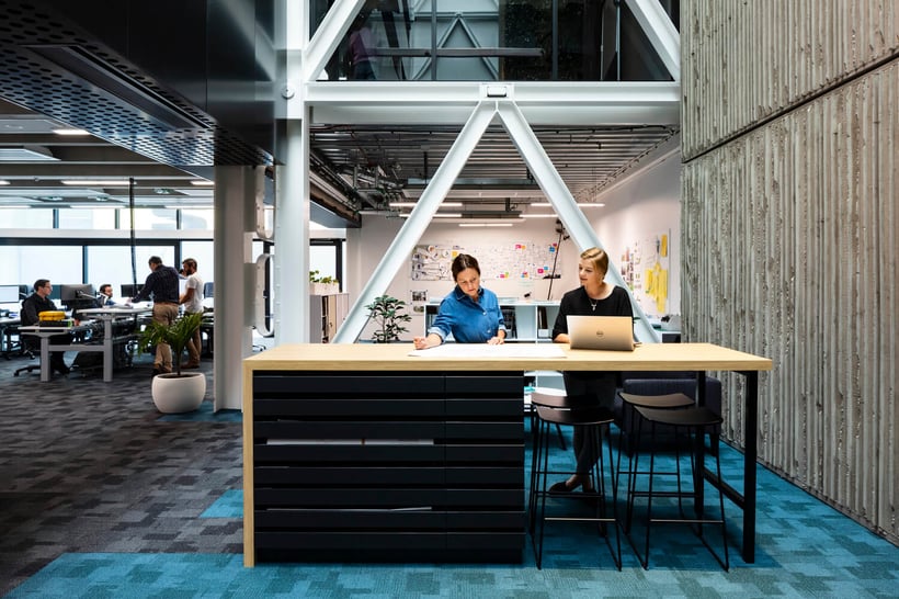employees collaborating at desk