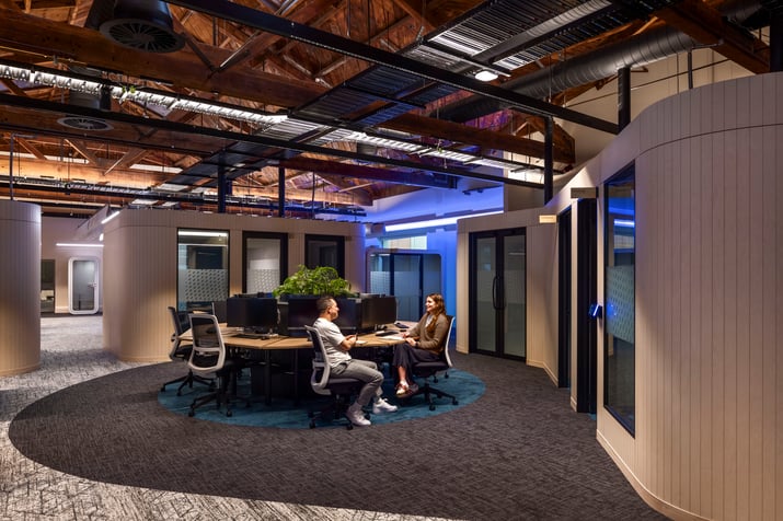 Open-plan workplace at Meridian Energy's Wellington office within the heritage Old Bank Arcade