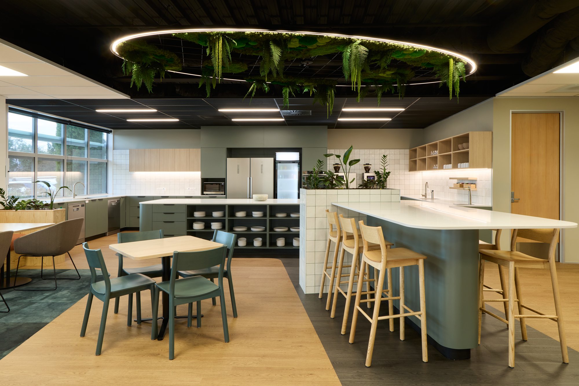 Open, warm kitchen and breakout space, encouraging connection and interaction for Orion's people