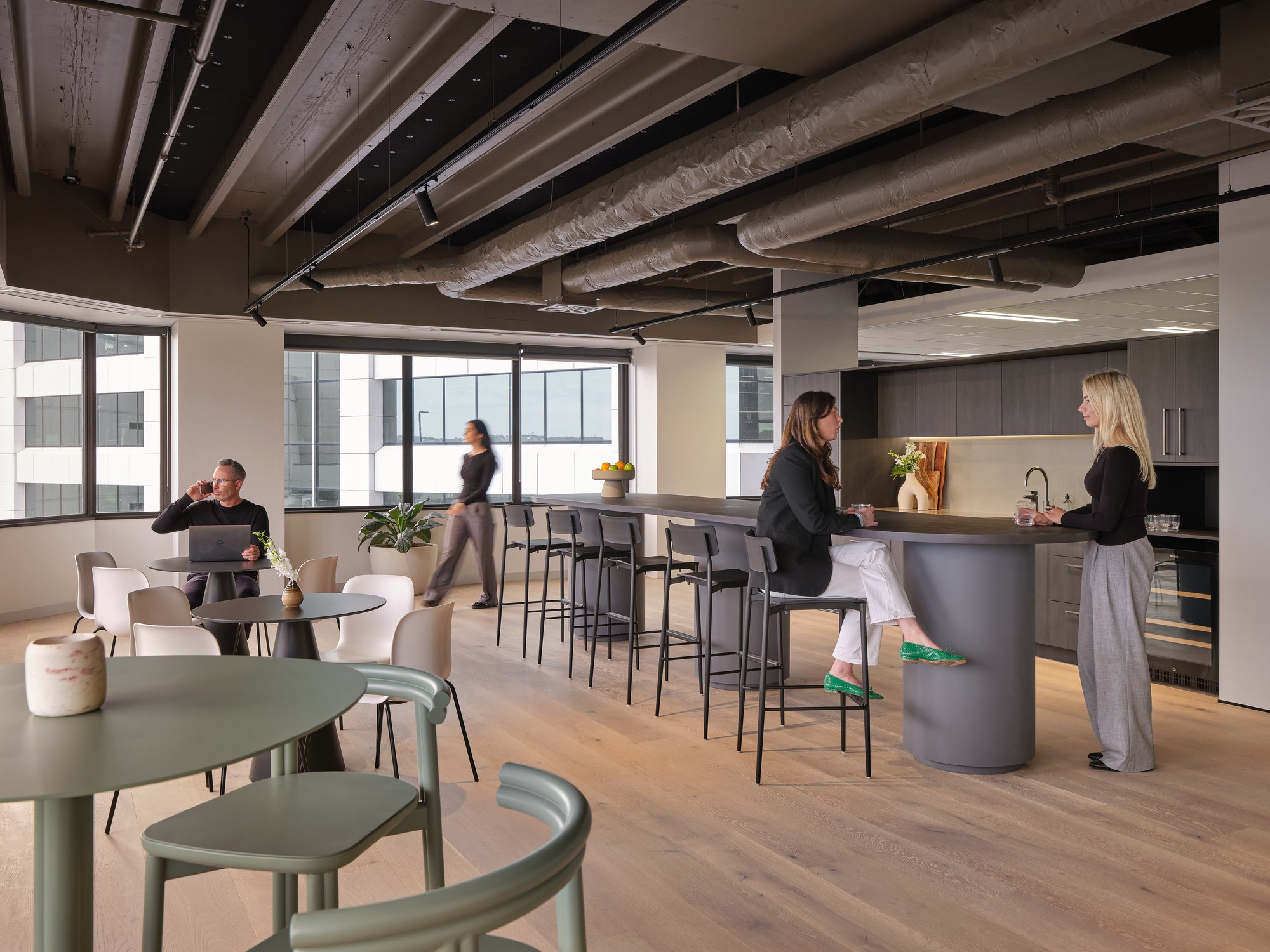 Generous kitchen and breakout with space for users to connect and relax