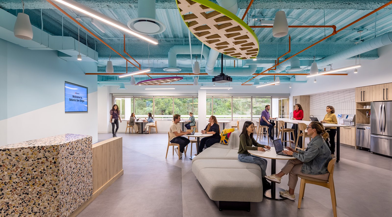 Employees interacting in an office reception