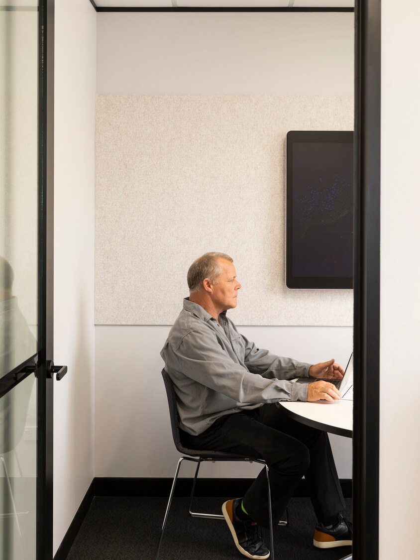 Closed meeting room and workspace at CPA Auckland office