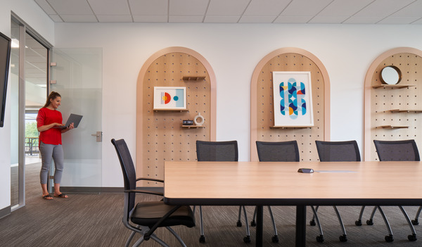 employee entering a conference room