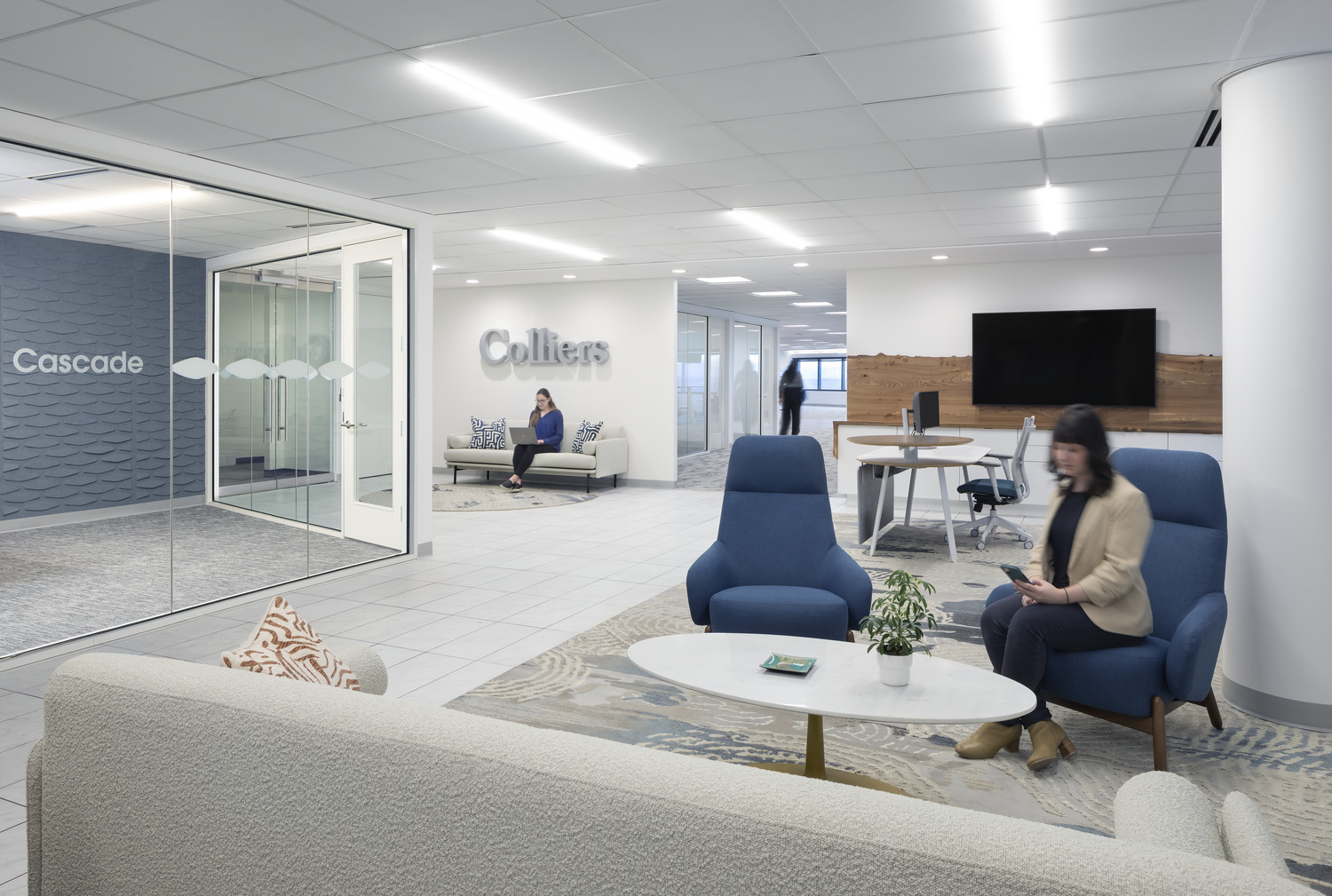 Coworkers sitting in office reception