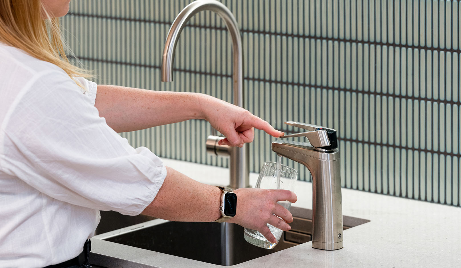 Barry Nilsson kitchen girl filling water