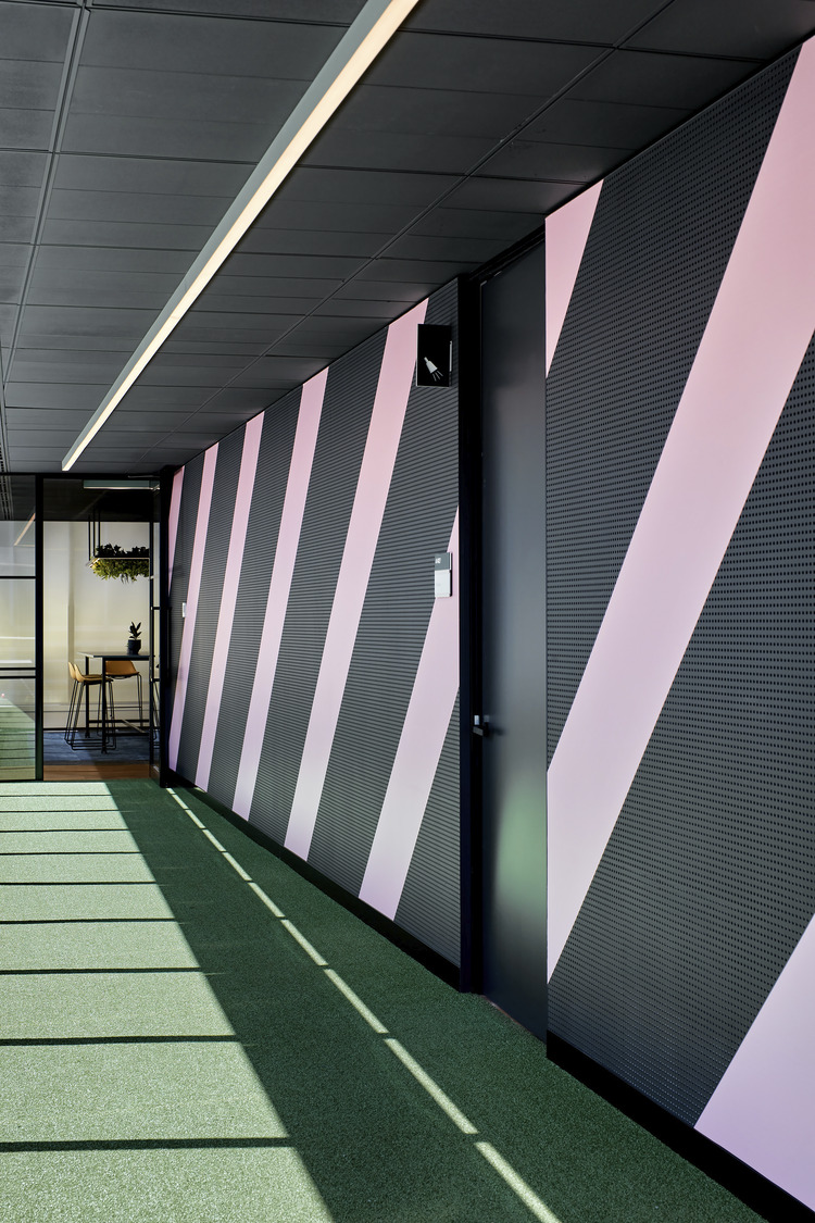 Global software company pink stripe wall