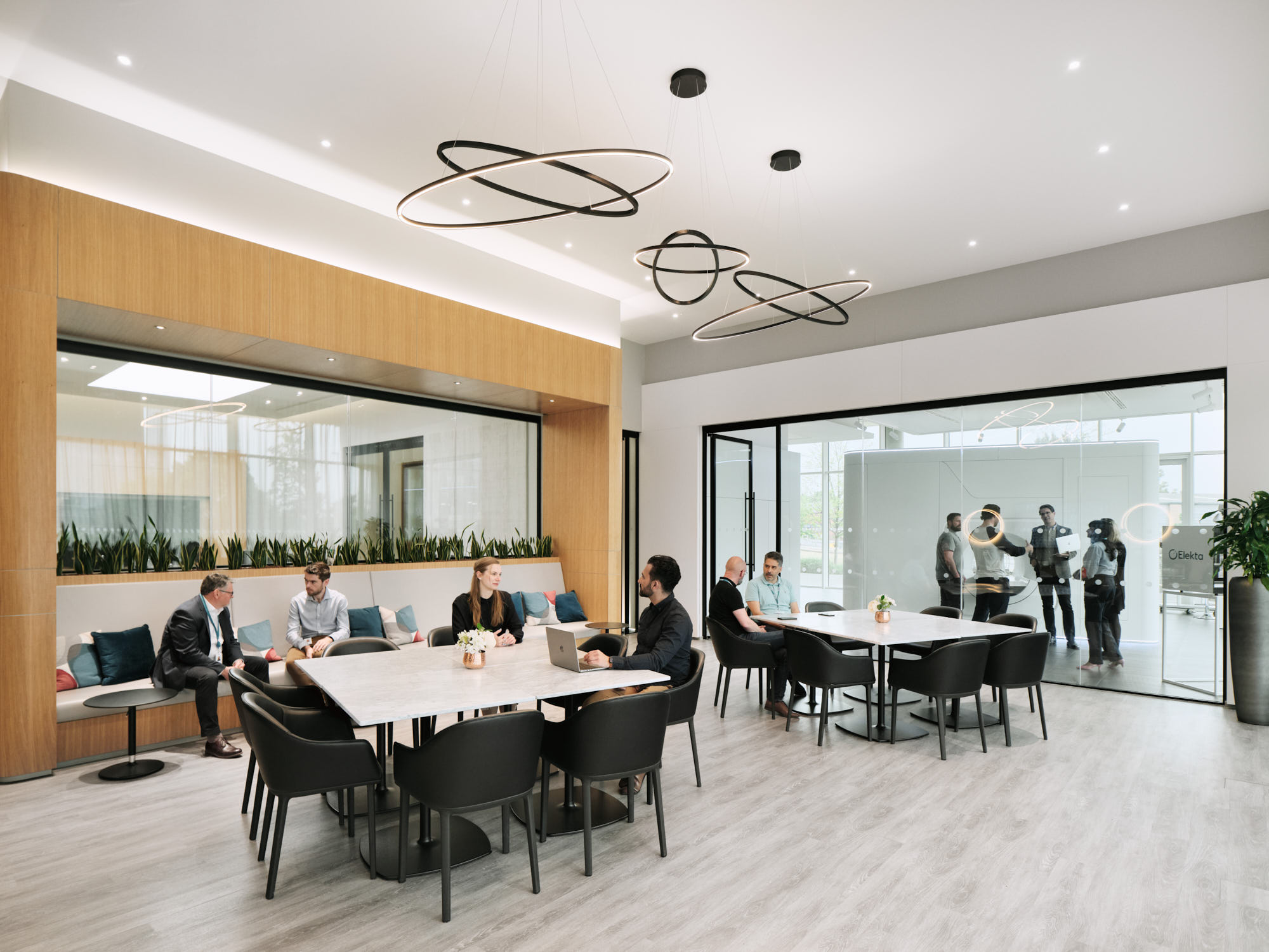 employees talking in open meeting area