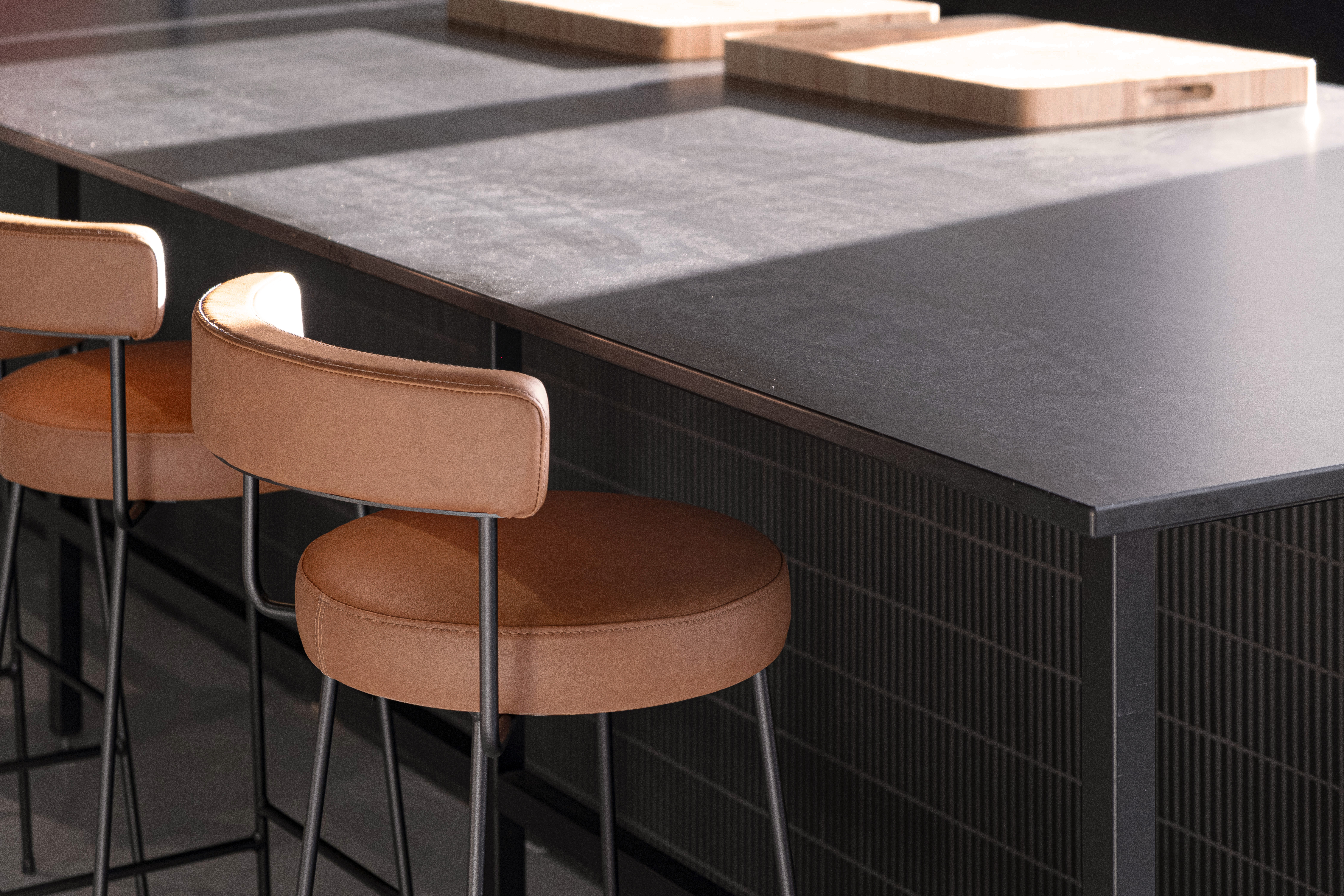 Detail of sunlight streaming onto kitchen benchtop