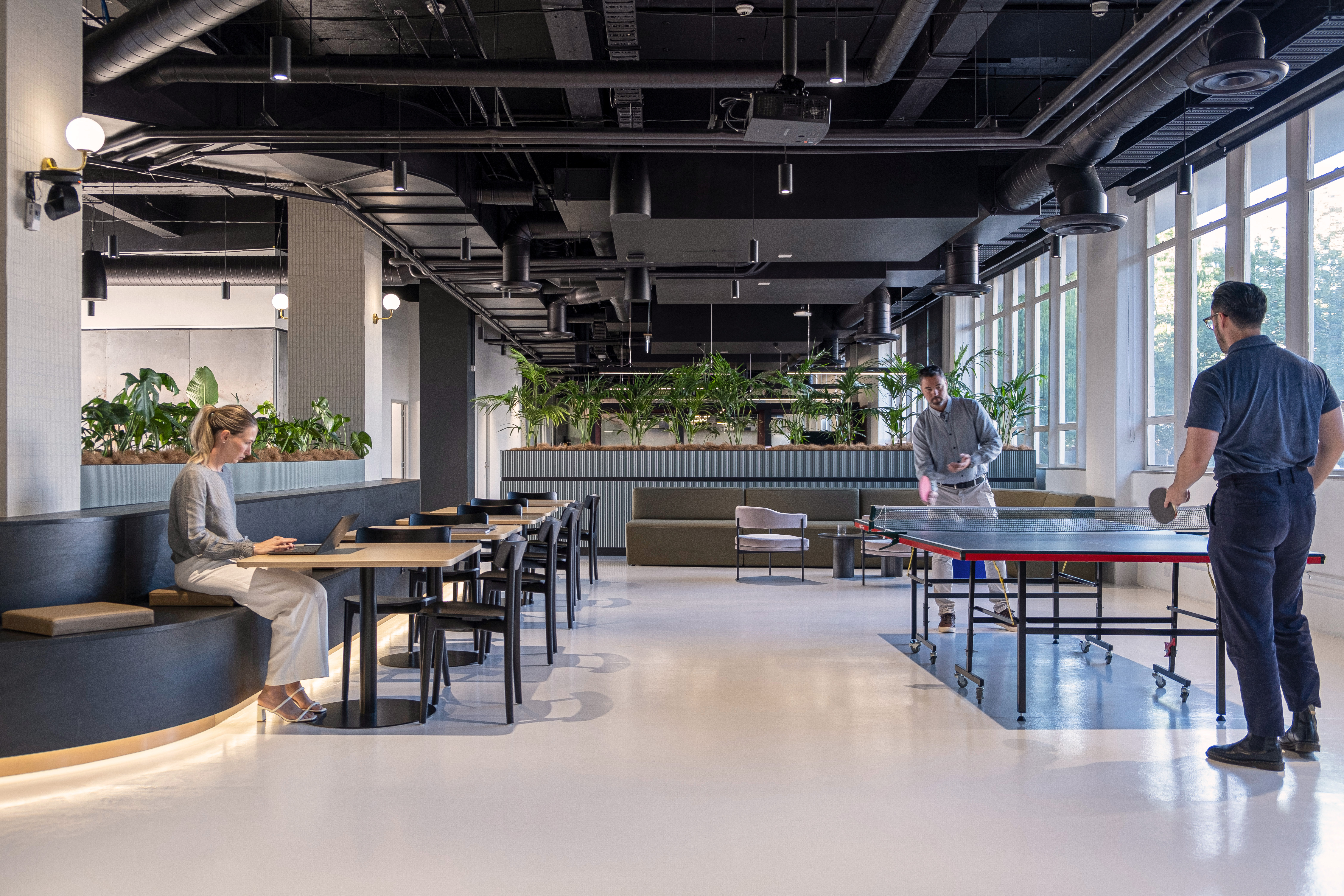 Cafe and breakout space with ping pong table