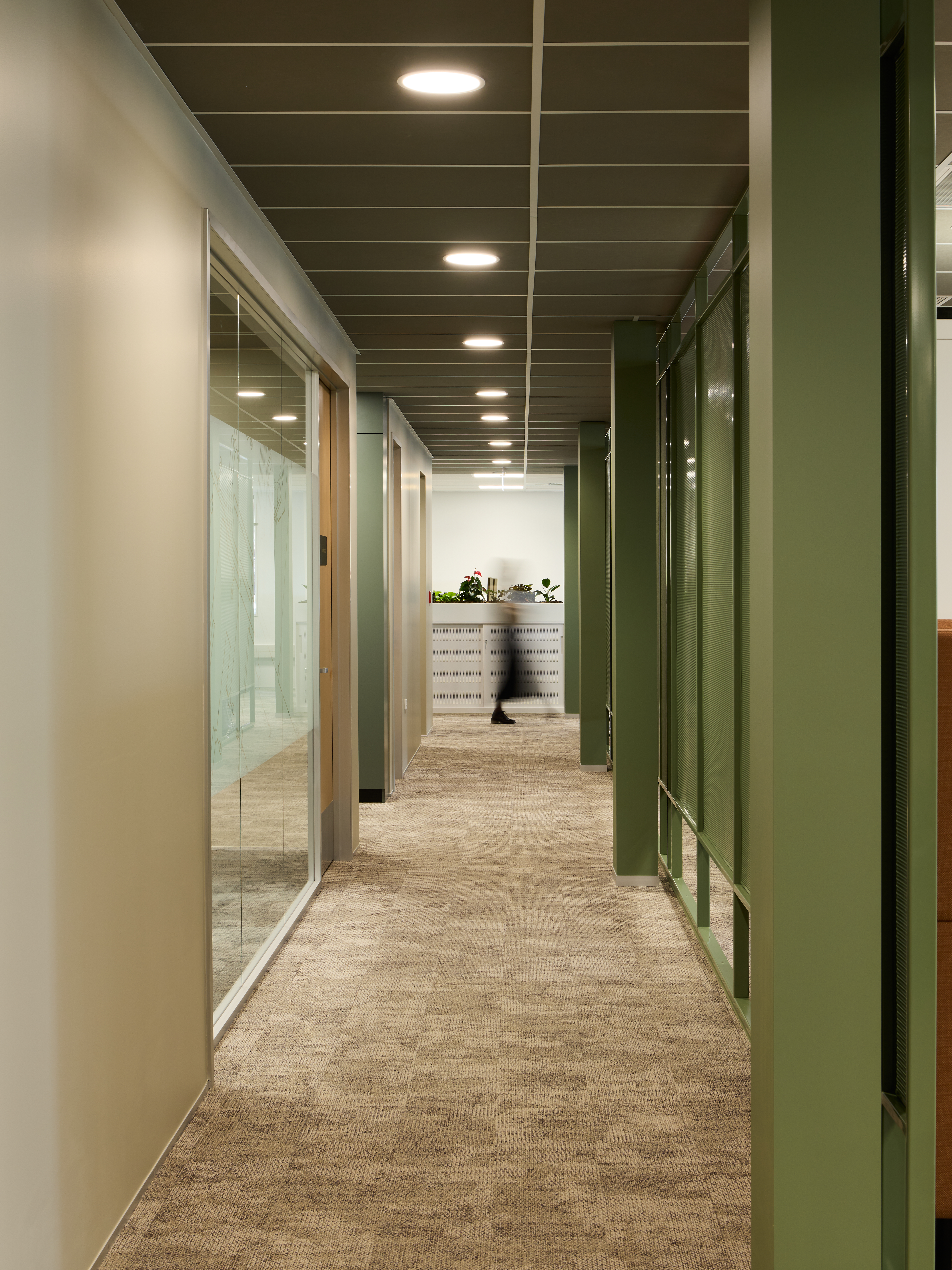 Neutral, brand-aligned colour palette designed and delivered by Unispace