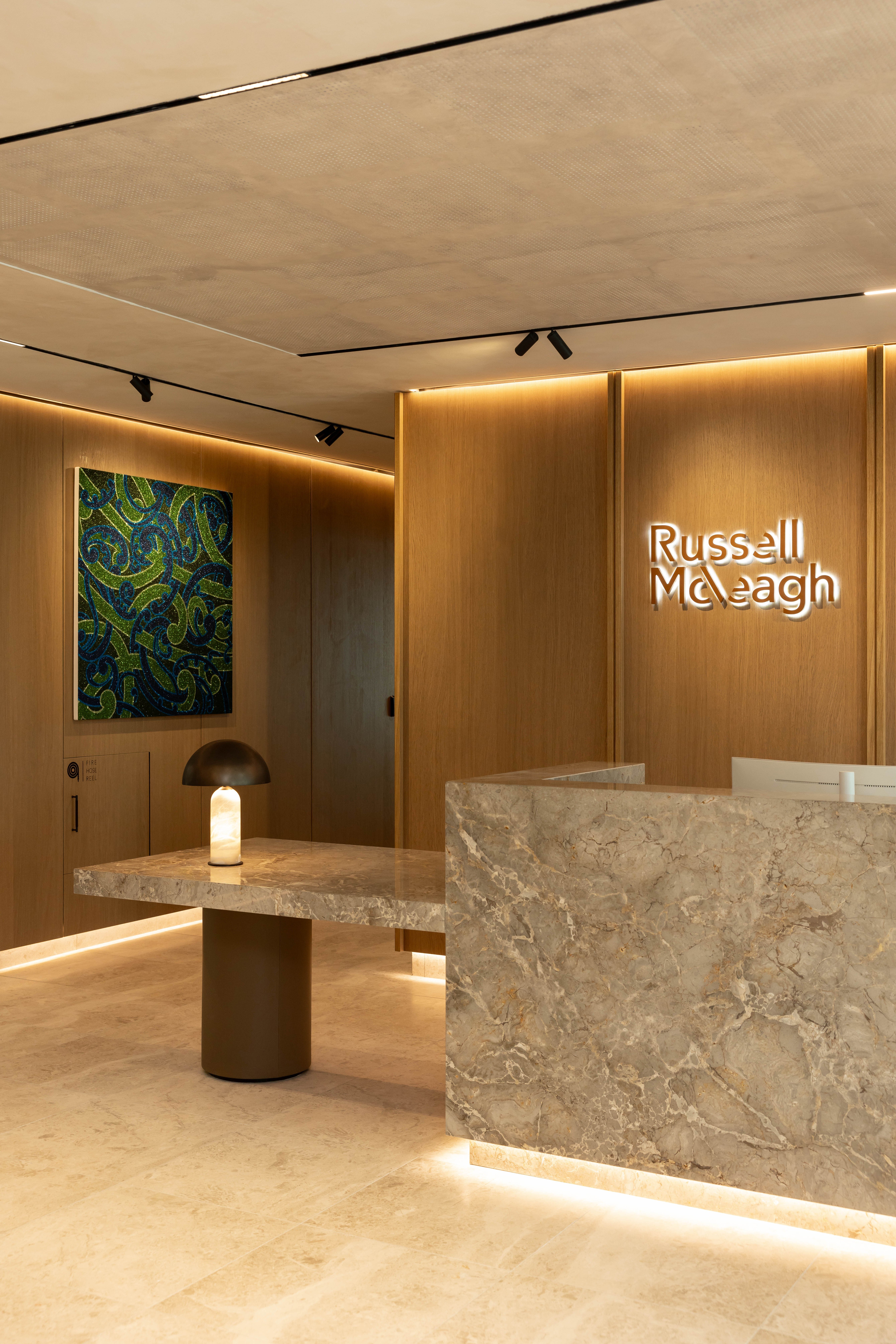 Detail shot of the client entrance and reception with Russell McVeagh's logo as a feature