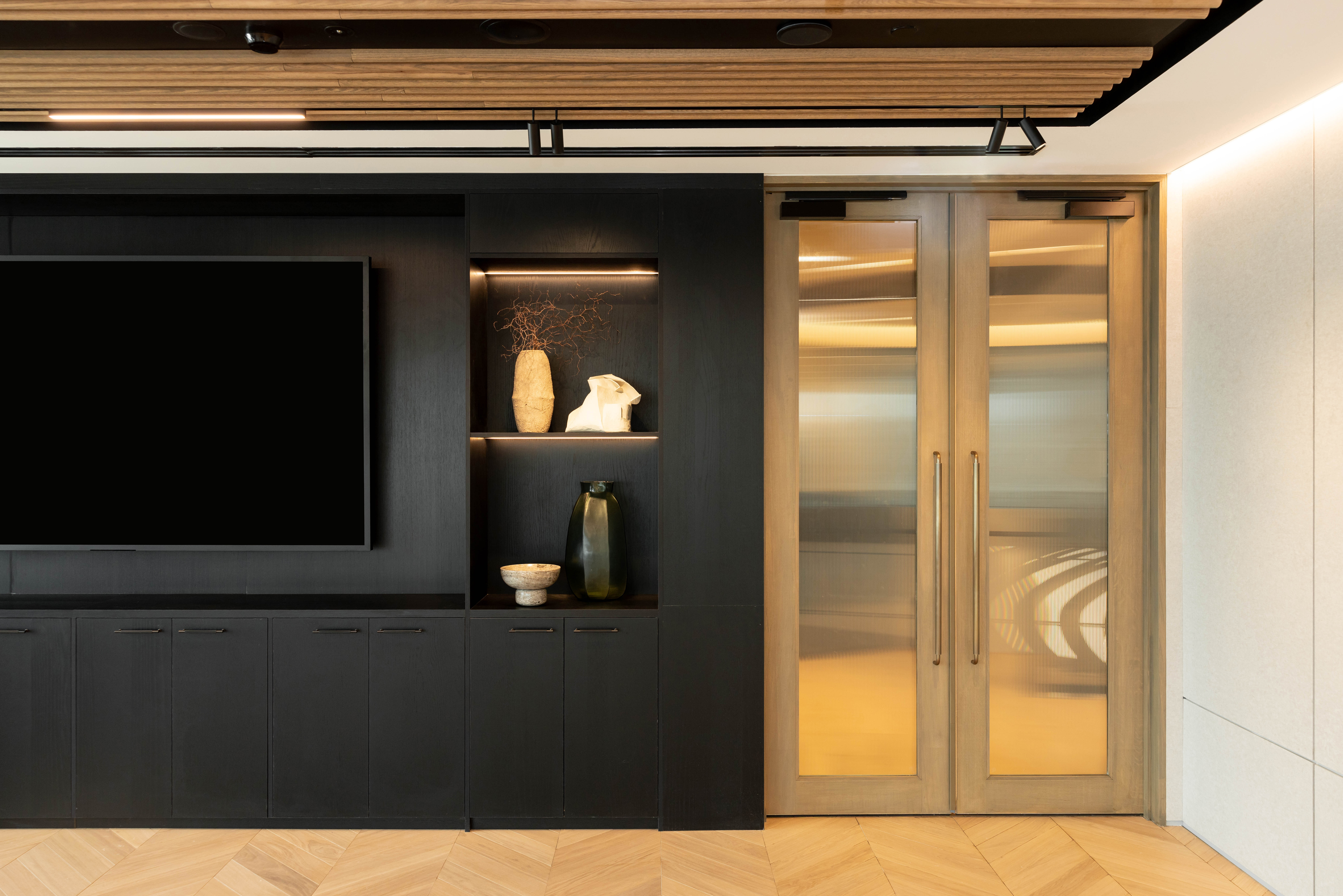 Event hosting area with A/V technology and styled open shelving
