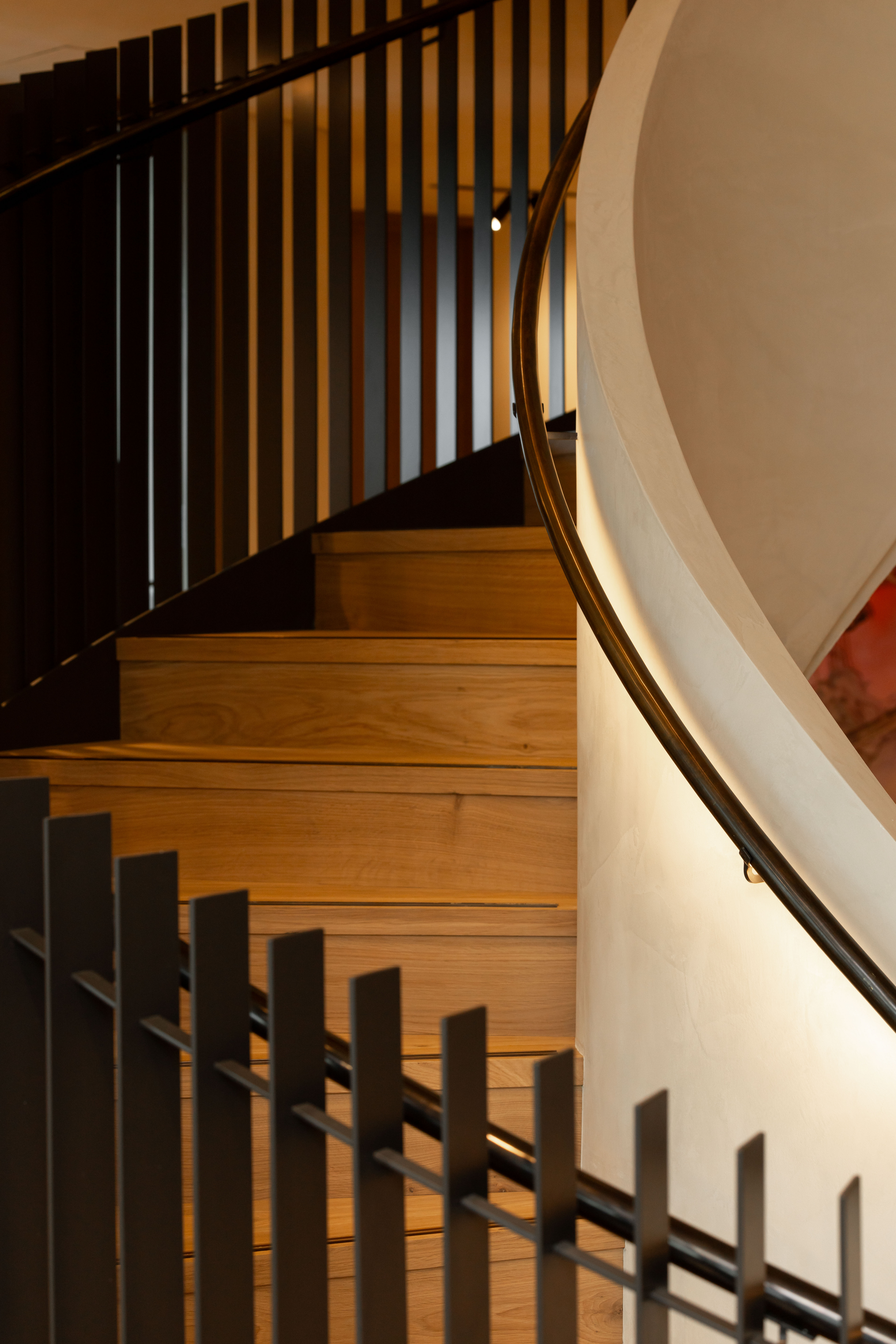 Detail shot of spiral staircase and handcrafted hand rail