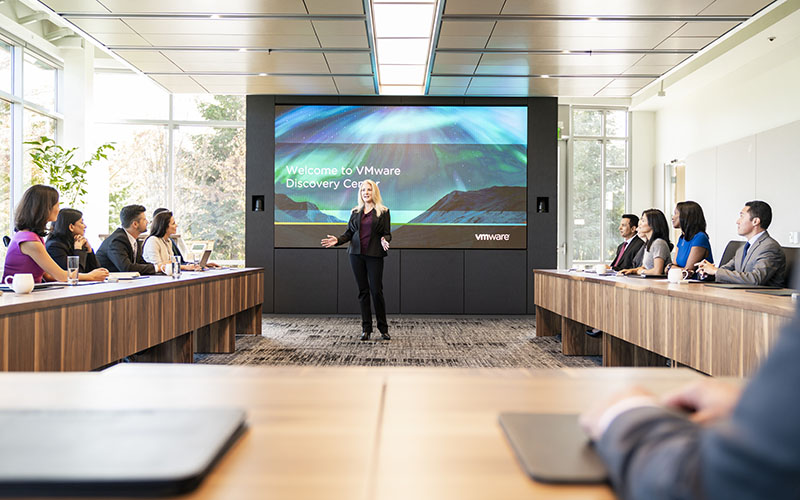 Woman presenting in a board room